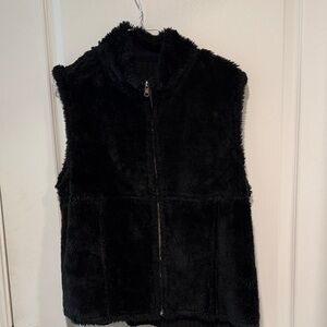 Black faux fur/sweater zipper vest. approx. 21 1/2 inch